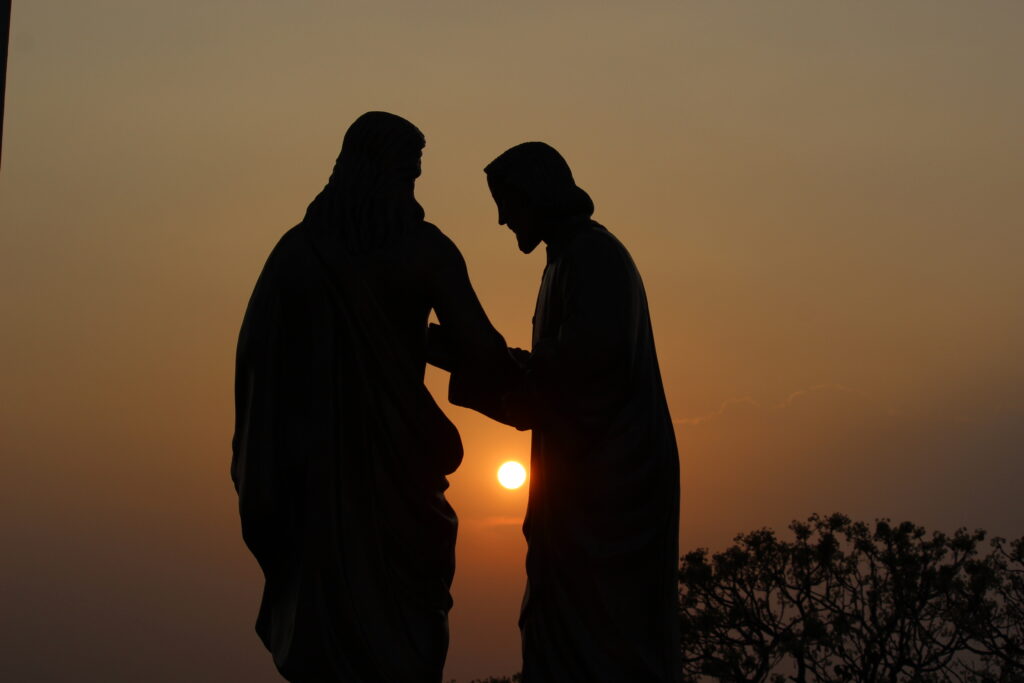 Silhoute of jesus with thomas statue shot by prakash digital marketer